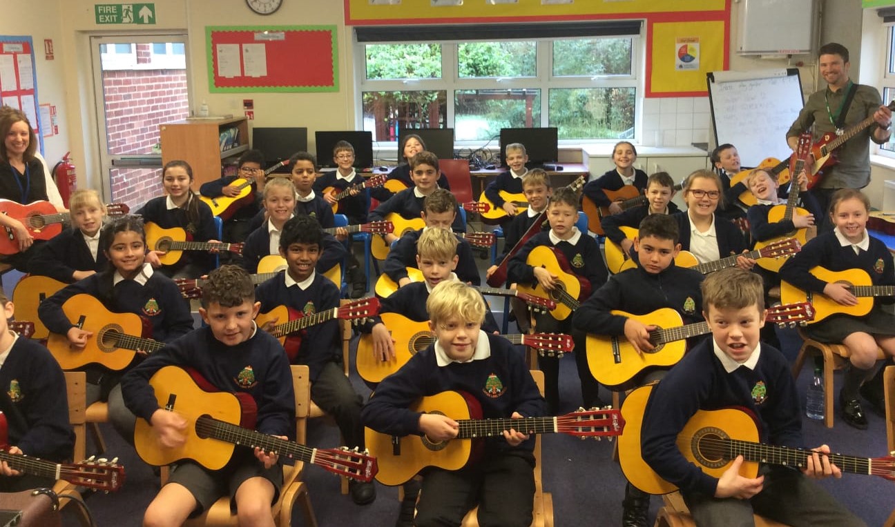 Whole Class Guitar Workshops with Kids That Rock 